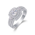 Jewelry wholesale Wholesale Moissanite D/VVS1 Round-Cut Halo Three-Stone Engagement Ring with Four-Prong Setting and Pavé Shoulders – 18K White Gold Vermeil on 925 Silver, GRA Certified