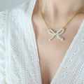 Jewelry wholesale 18K Stainless Steel Imitation Pearl Bow - shaped Pendant Necklace